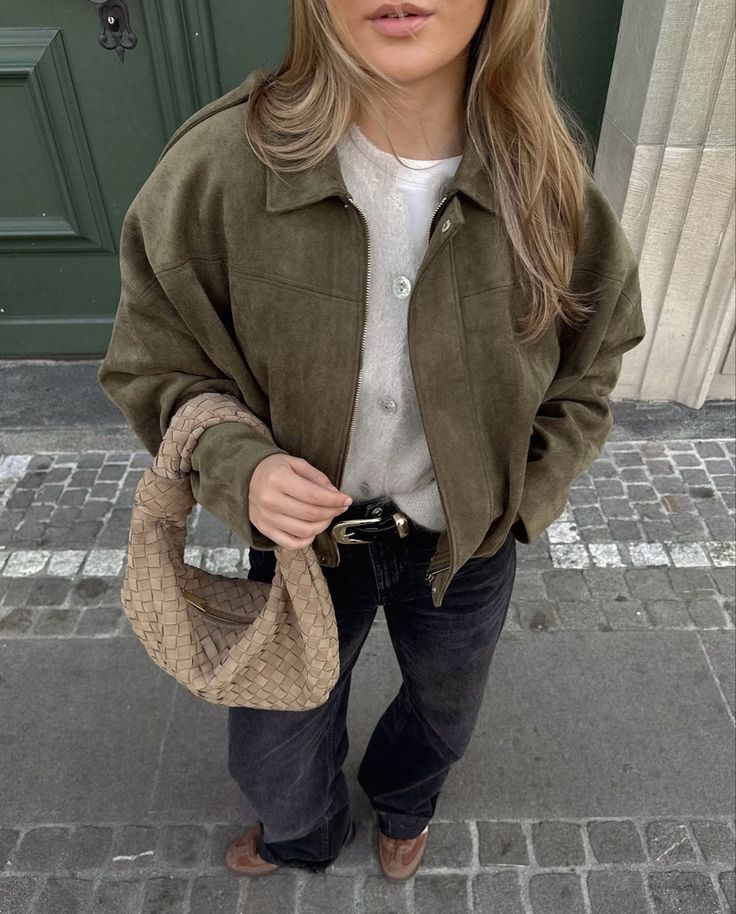 Suede-textured pilot jacket featuring a relaxed silhouette with batwing sleeves, clean front fastening and paneled construction. Medium-weight feel adds warmth without bulk, creating an effortless layer over tees, knits or dresses for city-ready style.