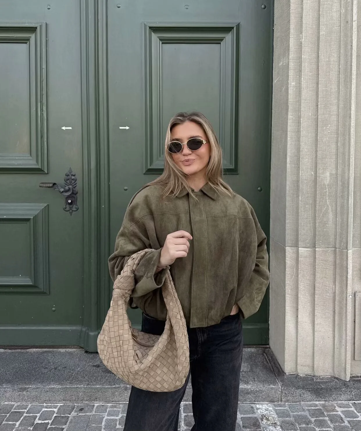 Suede-textured pilot jacket featuring a relaxed silhouette with batwing sleeves, clean front fastening and paneled construction. Medium-weight feel adds warmth without bulk, creating an effortless layer over tees, knits or dresses for city-ready style.