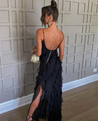 Women’s elegant tulle maxi dress with slender straps, open back and ruched waist. Floaty, ruffled texture and subtle side slit deliver graceful movement. A floor-skimming hem elongates for polished wedding or evening looks.