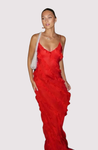Women’s elegant tulle maxi dress with slender straps, open back and ruched waist. Floaty, ruffled texture and subtle side slit deliver graceful movement. A floor-skimming hem elongates for polished wedding or evening looks.