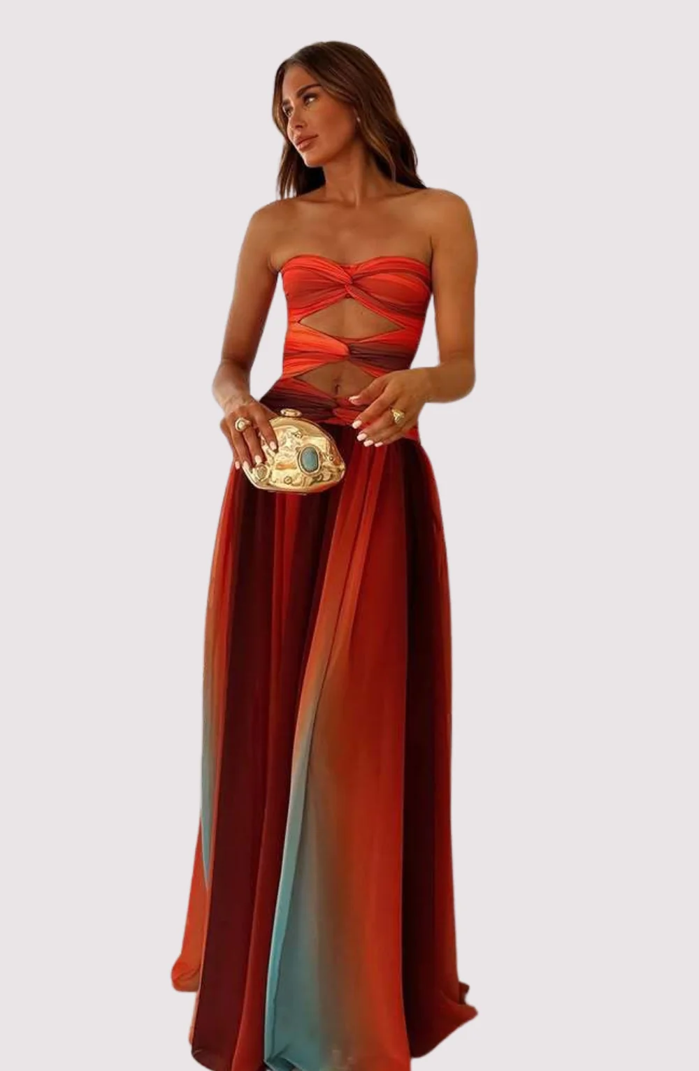 Laney strapless maxi dress featuring a twist-front neckline, waist cutouts, and an ombré A-line skirt. Lightweight, flowing silhouette designed for summer weddings, beach parties, and resort dinners with effortless elegance.