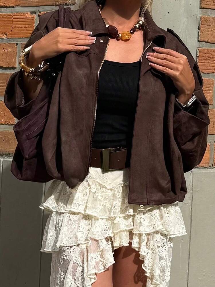 Faux suede bomber jacket in olive green featuring a structured collar, hidden front fastening and relaxed, easy-to-layer silhouette; a versatile outer layer for autumn and spring, pairing with denim, knits or tailored trousers.