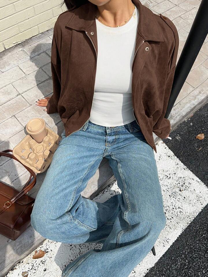 Faux suede bomber jacket in olive green featuring a structured collar, hidden front fastening and relaxed, easy-to-layer silhouette; a versatile outer layer for autumn and spring, pairing with denim, knits or tailored trousers.