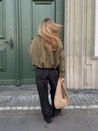 Faux suede bomber jacket in olive green featuring a structured collar, hidden front fastening and relaxed, easy-to-layer silhouette; a versatile outer layer for autumn and spring, pairing with denim, knits or tailored trousers.