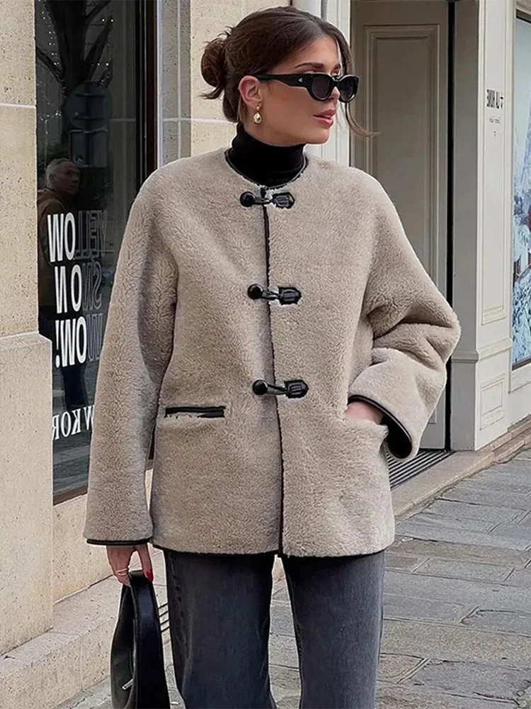 Liz Faux Shearling Toggle Coat in plush polyester with contrast black trim, classic toggle fastenings, smooth inner lining and practical side pockets. Relaxed yet structured silhouette designed for comfortable layering over knits or tailoring in autumn and winter.