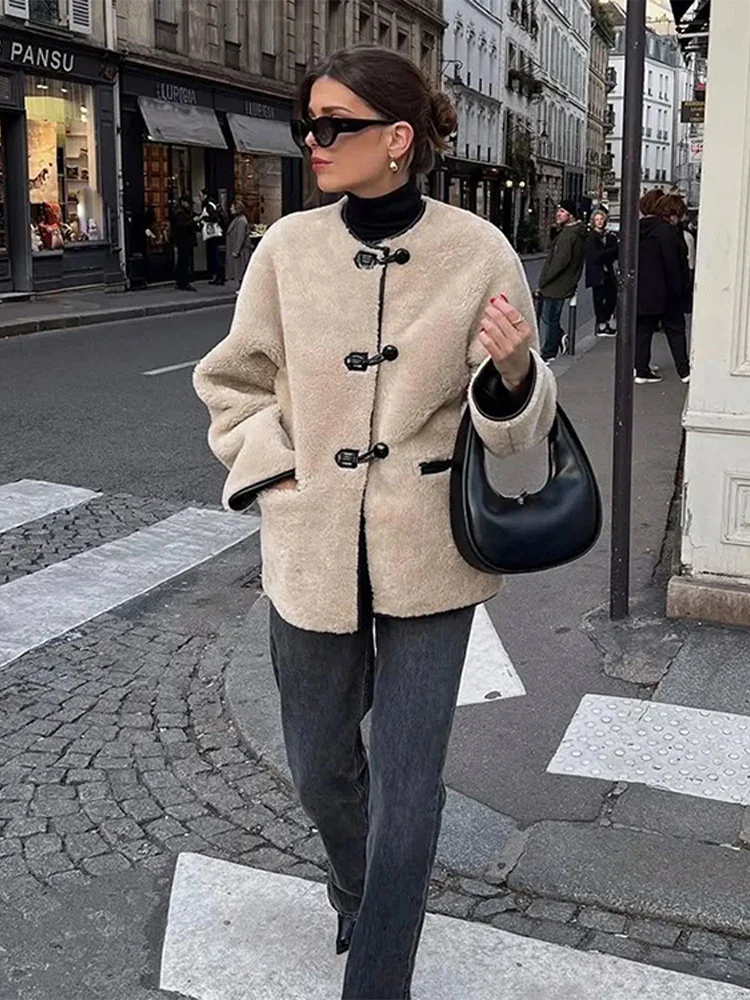 Liz Faux Shearling Toggle Coat in plush polyester with contrast black trim, classic toggle fastenings, smooth inner lining and practical side pockets. Relaxed yet structured silhouette designed for comfortable layering over knits or tailoring in autumn and winter.