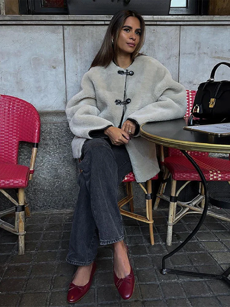 Liz Faux Shearling Toggle Coat in plush polyester with contrast black trim, classic toggle fastenings, smooth inner lining and practical side pockets. Relaxed yet structured silhouette designed for comfortable layering over knits or tailoring in autumn and winter.