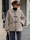Liz Faux Shearling Toggle Coat in plush polyester with contrast black trim, classic toggle fastenings, smooth inner lining and practical side pockets. Relaxed yet structured silhouette designed for comfortable layering over knits or tailoring in autumn and winter.