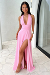 Margo halter maxi dress featuring a plunging V neckline, waist-defining band, invisible back zip, and double lining. Floor-length skirt with side slit for movement and allure, ideal for weddings, parties, and formal nights.