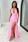 Margo halter maxi dress featuring a plunging V neckline, waist-defining band, invisible back zip, and double lining. Floor-length skirt with side slit for movement and allure, ideal for weddings, parties, and formal nights.