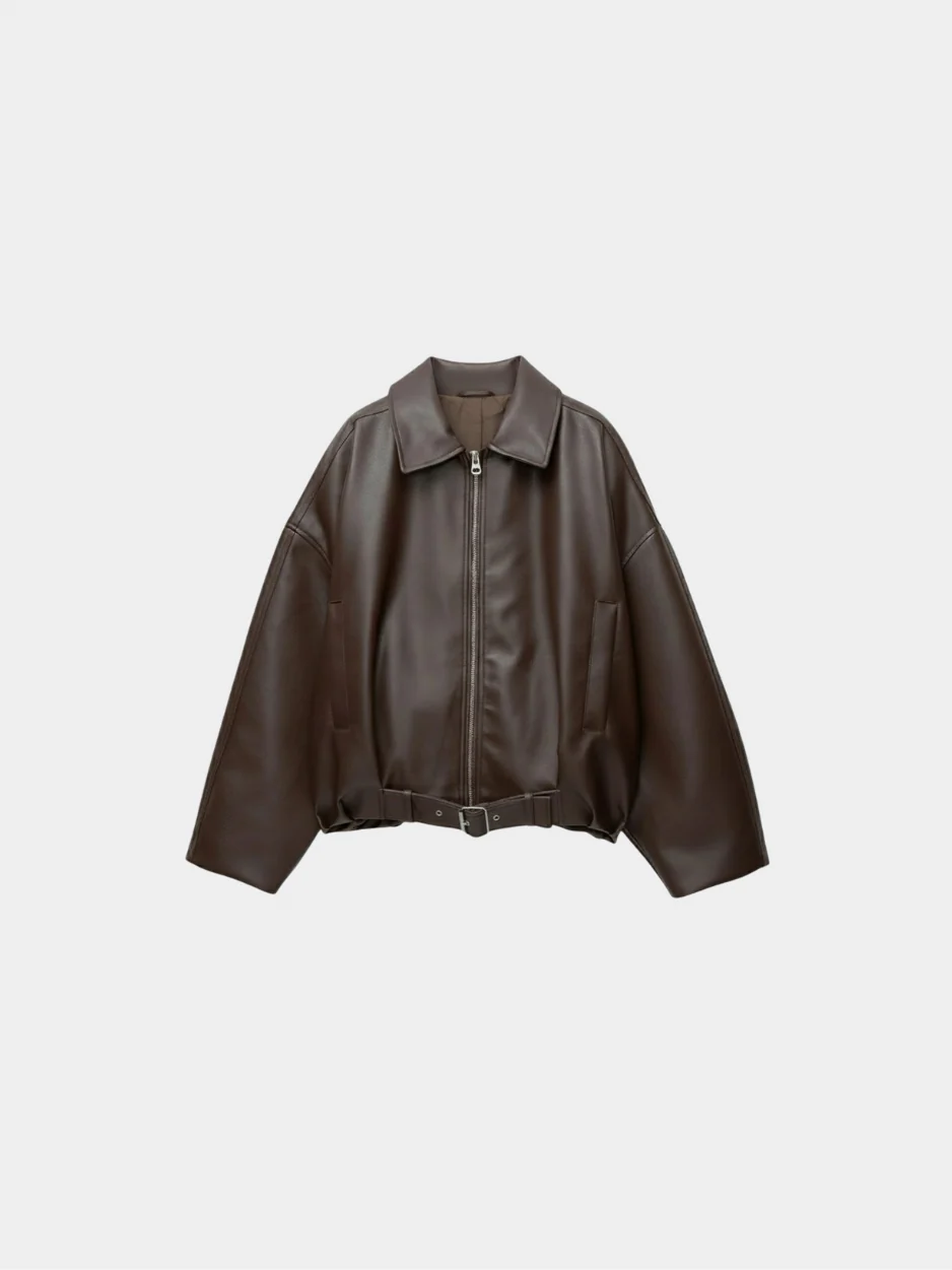 Mary Women’s Black Faux Leather Oversized Shirt Jacket with zip front, dropped shoulders and soft lining; relaxed silhouette for layering as a shirt or light jacket; minimalist design for versatile day-to-night styling.