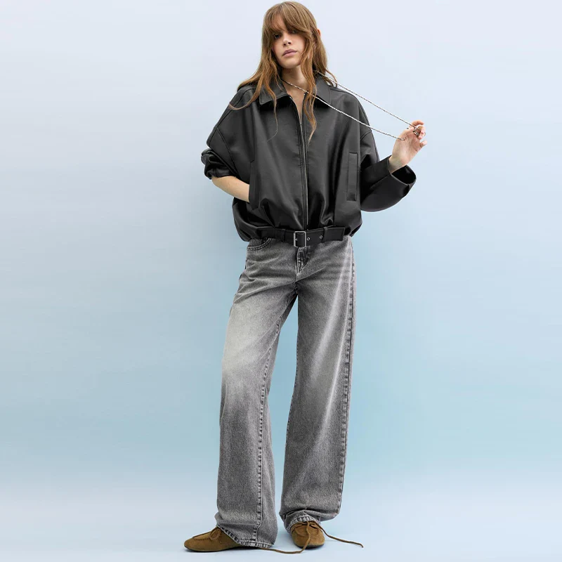 Mary Women’s Black Faux Leather Oversized Shirt Jacket with zip front, dropped shoulders and soft lining; relaxed silhouette for layering as a shirt or light jacket; minimalist design for versatile day-to-night styling.