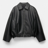 Mary Women’s Black Faux Leather Oversized Shirt Jacket with zip front, dropped shoulders and soft lining; relaxed silhouette for layering as a shirt or light jacket; minimalist design for versatile day-to-night styling.