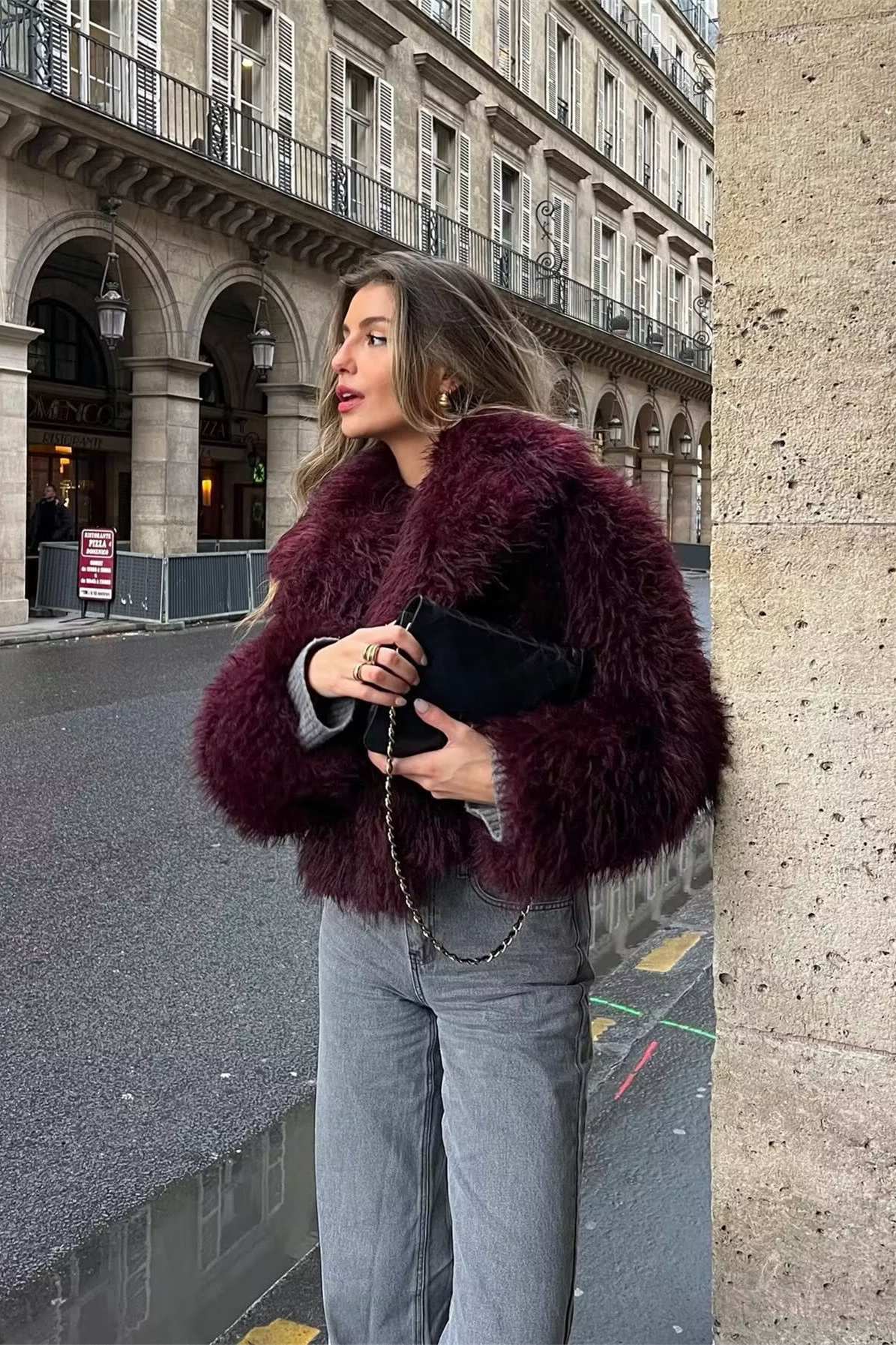 Cropped fluffy jacket in deep wine with a refined notch lapel and subtly voluminous sleeves. Plush, cosy texture and hip-skimming length create a chic layer over denim or evening dresses, adding warm, modern elegance for cooler days.