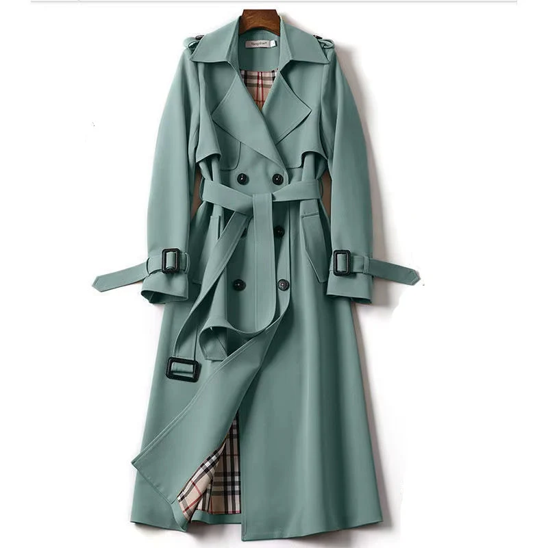 Women’s double-breasted coat with a slim, structured silhouette, classic collar, long sleeves and mid-length cut. Smooth, solid-color finish for Autumn/Winter; available in Khaki, Black, Beige and Blue, sizes S–4XL—elegant, versatile outerwear.