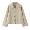 Classic short trench jacket in a warm neutral tone, featuring a pointed collar, button-down closure, minimalist front pockets and a slightly cropped, relaxed silhouette. Soft, structured fabric layers easily over knits or blouses for everyday polish.