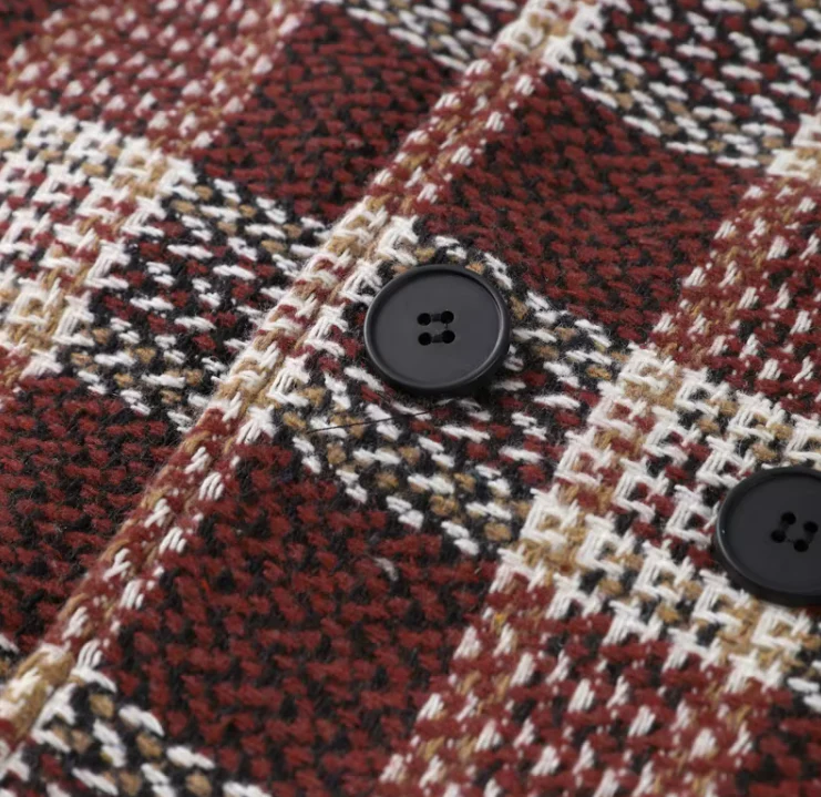 Rose checked wool-blend coat featuring a double-breasted front, high stand collar and softly flared sleeves. Warm beige and burgundy check with a textured finish; a feminine, vintage-leaning silhouette ideal for autumn and winter styling with boots or trousers.