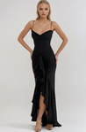 Ruffled bodycon gown with spaghetti straps in lightweight polyester blend, featuring ruched waist, cascading ruffle hem, and high slit. Elegant neckline and sleek silhouette ideal for formal events and cocktail evenings.