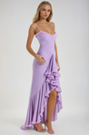 Ruffled bodycon gown with spaghetti straps in lightweight polyester blend, featuring ruched waist, cascading ruffle hem, and high slit. Elegant neckline and sleek silhouette ideal for formal events and cocktail evenings.