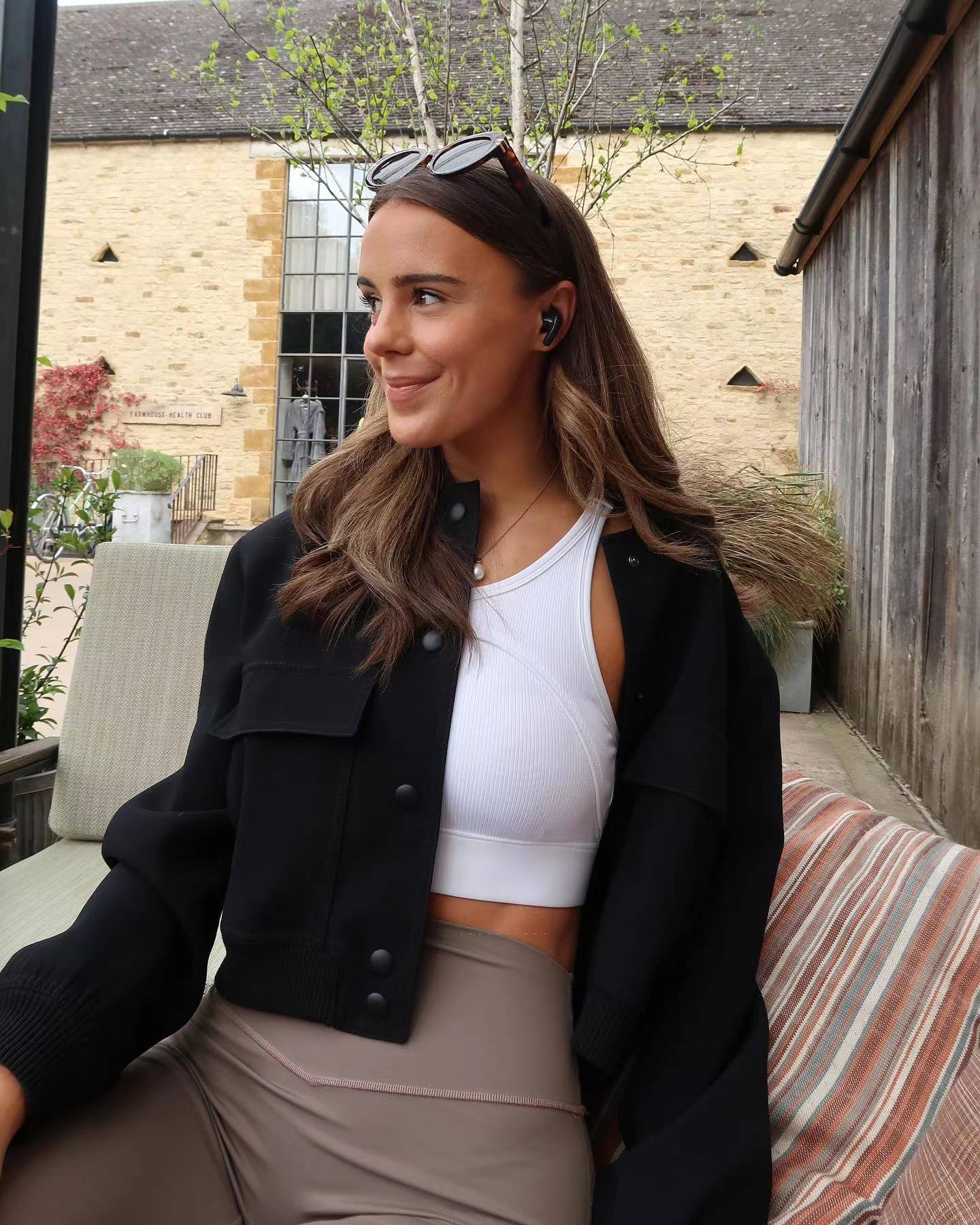 Oversized bomber jacket featuring a ribbed stand collar, ribbed cuffs and hem, clean snap-button front and two large flap pockets. Soft-touch, lightweight feel and relaxed drape make an easy, refined layer over tees, knits or dresses for transitional weather.