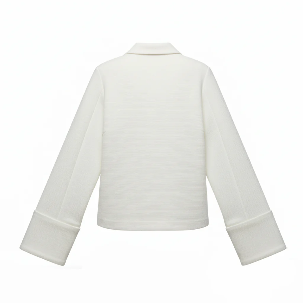 Sharon lightweight tie-front jacket in cotton-blend knit featuring a pointed collar, soft open front with fabric ties, flared sleeves and a clean, cropped silhouette. Minimal, refined layer to wear over tees, blouses or dresses for day-to-evening looks.
