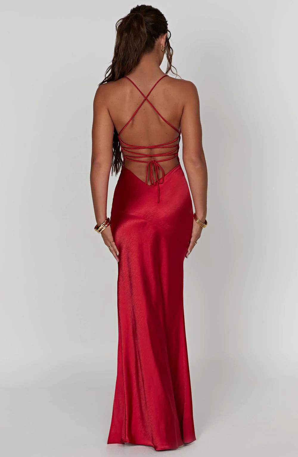Sindy satin slit maxi dress featuring slim straps, a high side slit and a back rope tie; body-skimming silhouette with stretch for a sculpted fit and a lightweight drape that flatters without showing folds. Composition: Cotton, Polyester, Elastane, Satin.
