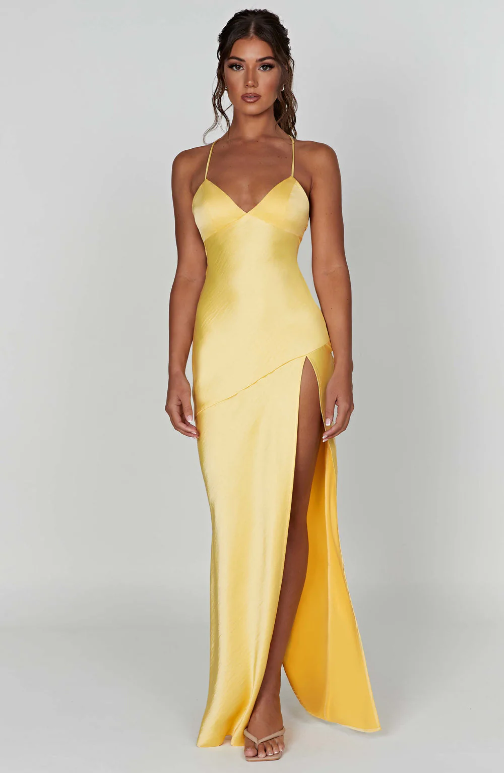 Sindy satin slit maxi dress featuring slim straps, a high side slit and a back rope tie; body-skimming silhouette with stretch for a sculpted fit and a lightweight drape that flatters without showing folds. Composition: Cotton, Polyester, Elastane, Satin.