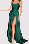 Long satin slit maxi dress featuring a soft cowl neckline, delicate tie straps and an open back. Body-skimming silhouette with light drape, gentle elastane stretch, full lining, hidden zipper and discreet side pockets—ideal for weddings and galas.