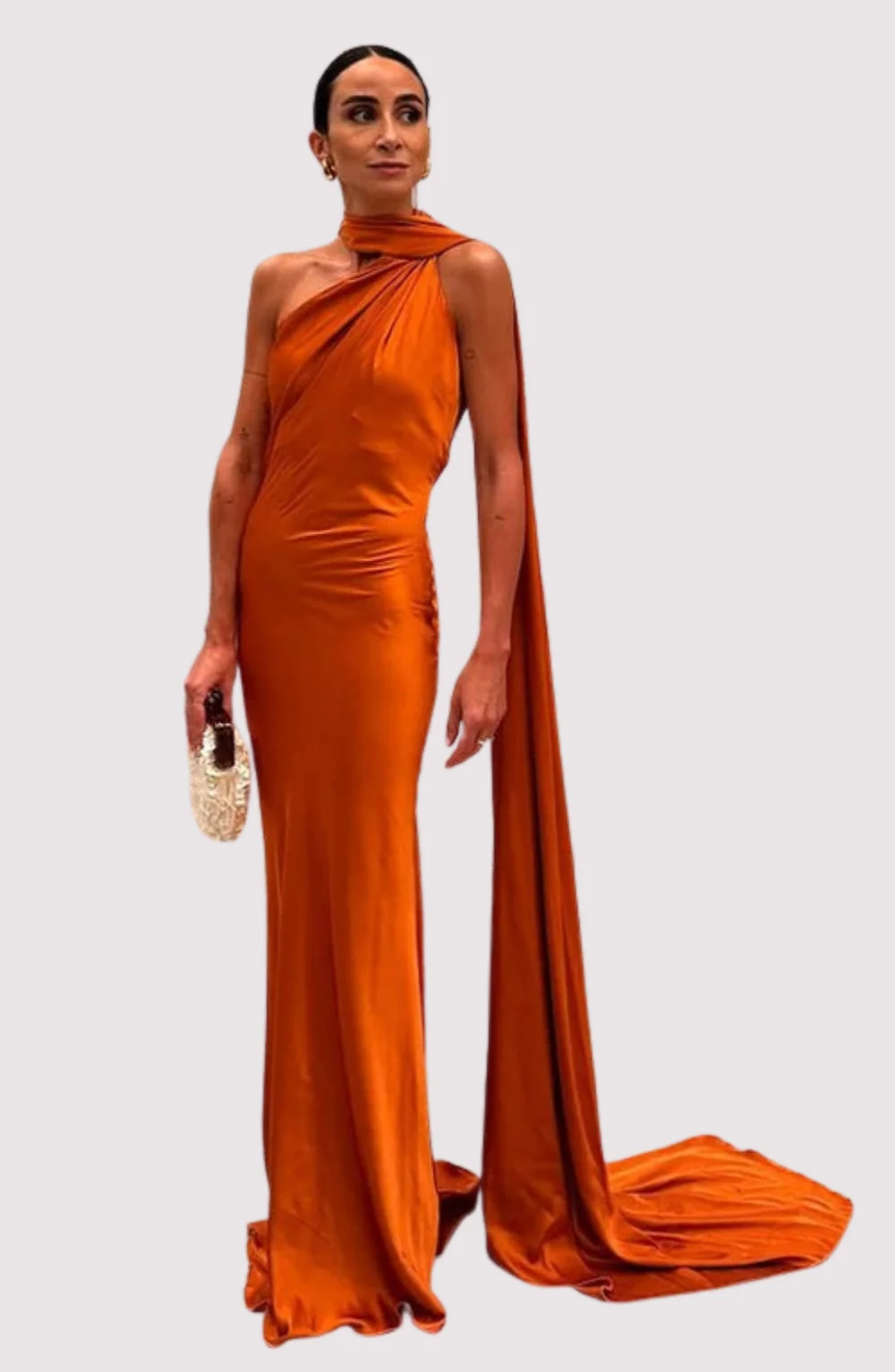 Stella Timeless Cape Gown in lustrous satin featuring a dramatic one-shoulder cape, built-in bra, and sculpted mermaid silhouette with a sweeping train. Contoured seams define the waist and hips for a polished, statement look at formal events.