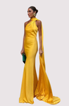 Stella Timeless Cape Gown in lustrous satin featuring a dramatic one-shoulder cape, built-in bra, and sculpted mermaid silhouette with a sweeping train. Contoured seams define the waist and hips for a polished, statement look at formal events.