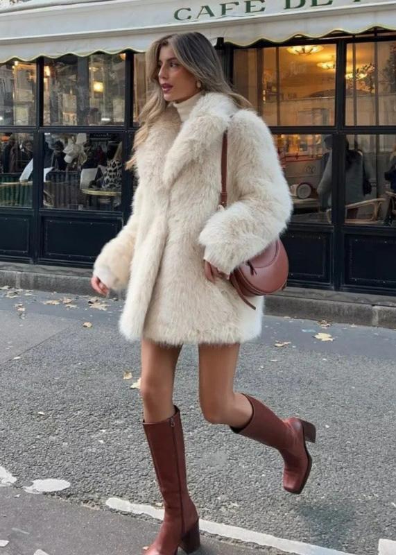 Women’s off-white faux-fur coat featuring a plush exterior, smooth lining and a clean, flattering silhouette. Lightweight yet warm, it layers effortlessly over dresses, knits or casual outfits—an elegant lined winter jacket for day or night.