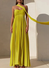 Zaira strapless pleated maxi dress featuring a sweetheart neckline, subtly structured bust and fitted bodice with adjustable side ties. Crafted from breathable 100% polyester, the elegant pleats flow and elongate—perfect for weddings, garden parties and evening cocktails.