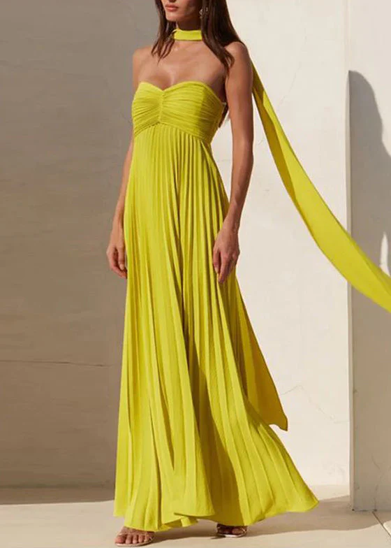 Zaira strapless pleated maxi dress featuring a sweetheart neckline, subtly structured bust and fitted bodice with adjustable side ties. Crafted from breathable 100% polyester, the elegant pleats flow and elongate—perfect for weddings, garden parties and evening cocktails.