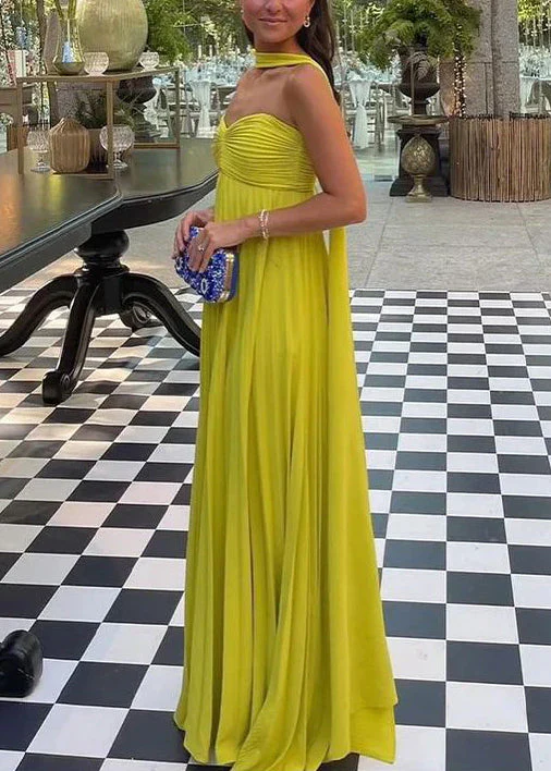 Zaira strapless pleated maxi dress featuring a sweetheart neckline, subtly structured bust and fitted bodice with adjustable side ties. Crafted from breathable 100% polyester, the elegant pleats flow and elongate—perfect for weddings, garden parties and evening cocktails.