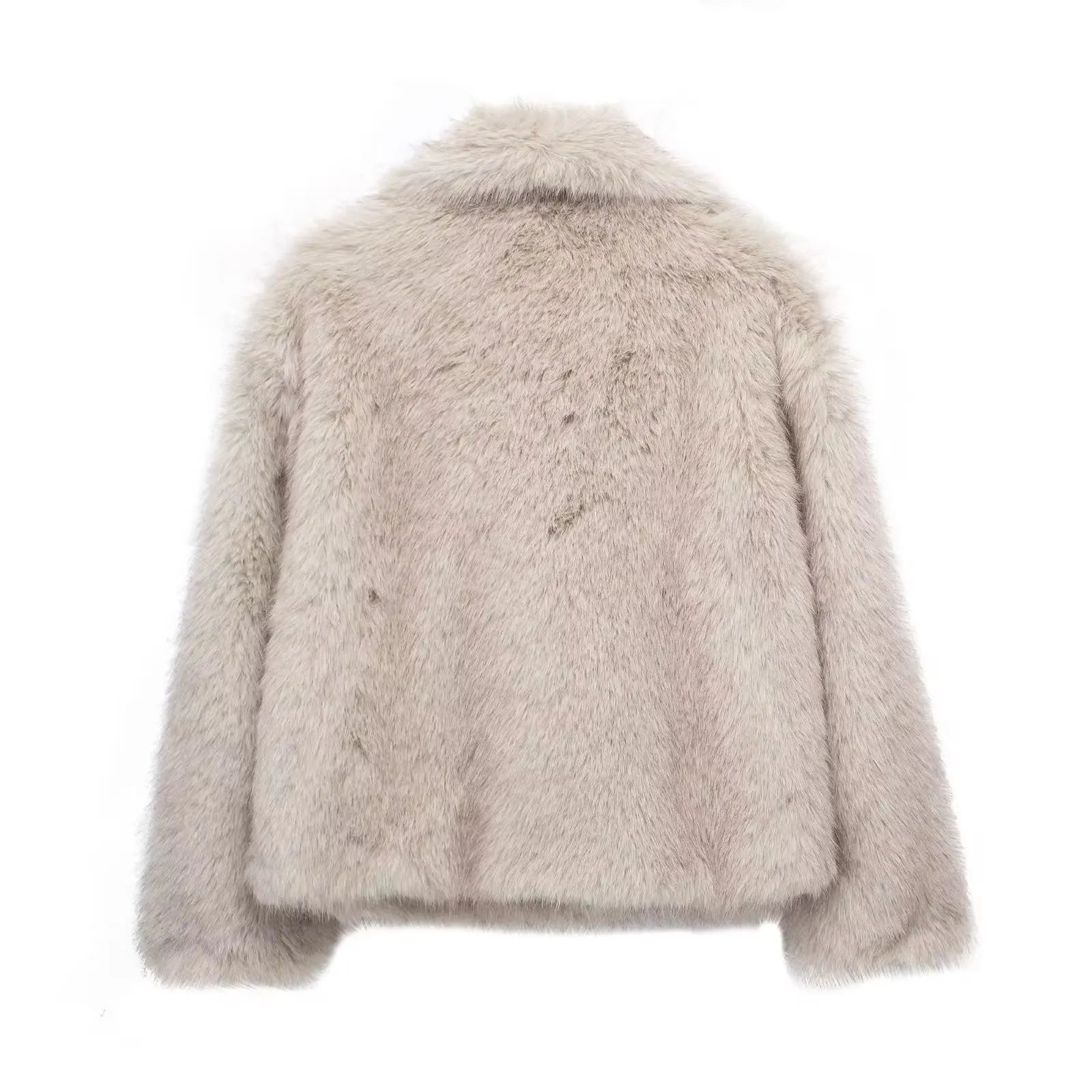 Adele faux fur oversized coat in plush synthetic fibres with wide lapel collar, concealed front and relaxed silhouette. Warm, durable and cruelty-free outerwear that layers over jeans, dresses and evening looks for chic winter style.